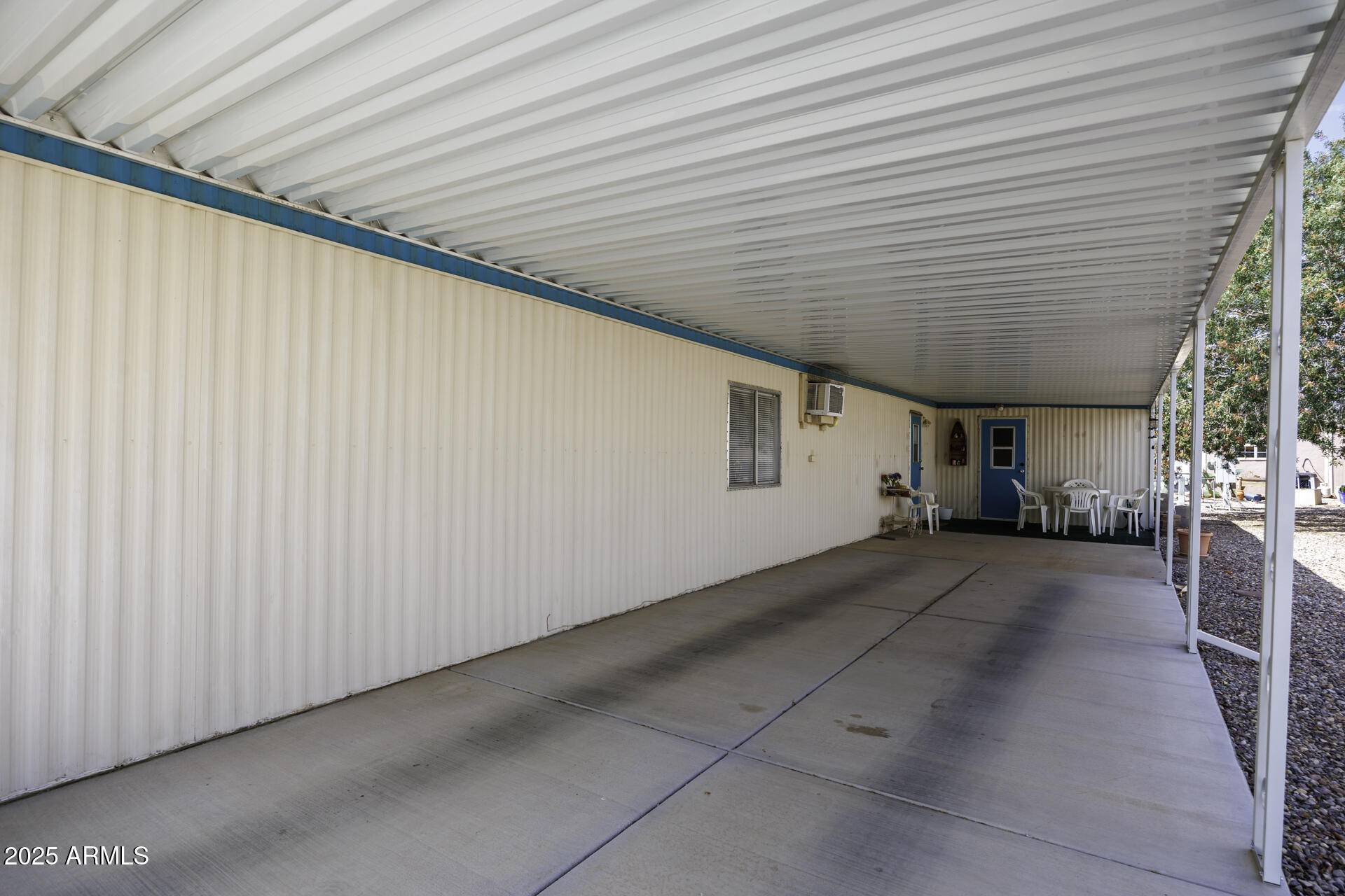 2100 North Trekell Road, Unit 347 Casa Grande, AZ 85122 - Photo 19 of 38 a view of a house with a backyard