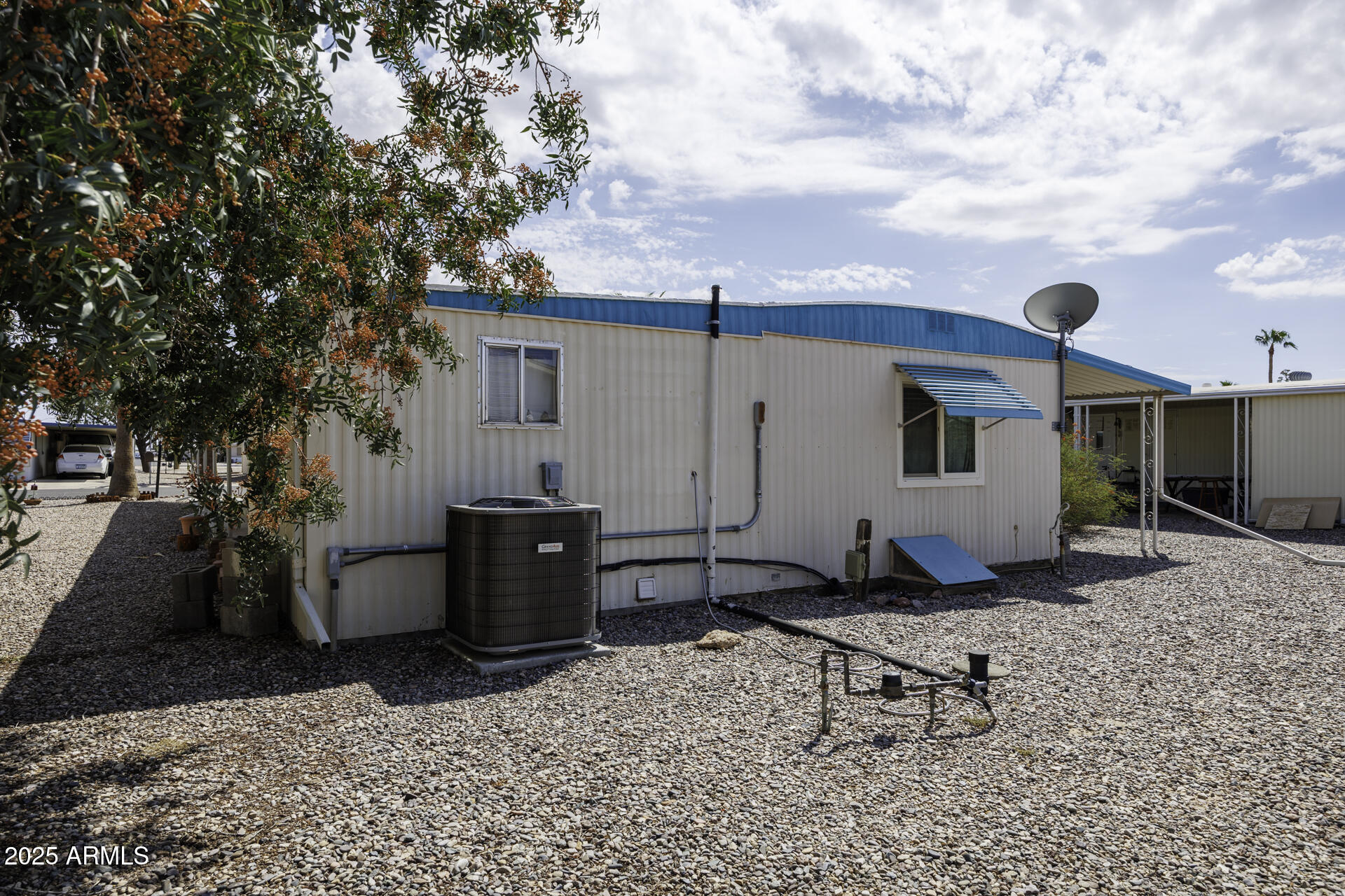 2100 North Trekell Road, Unit 347 Casa Grande, AZ 85122 - Photo 24 of 38 a view of a backyard with sitting area