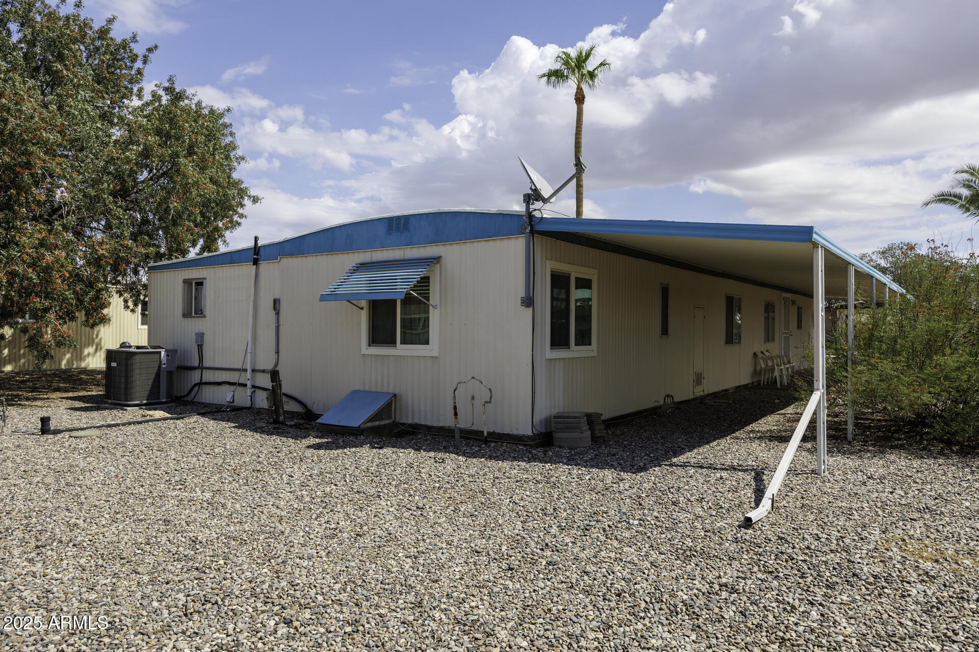 2100 North Trekell Road, Unit 347 Casa Grande, AZ 85122 - Photo 26 of 38 a front view of a house with garden