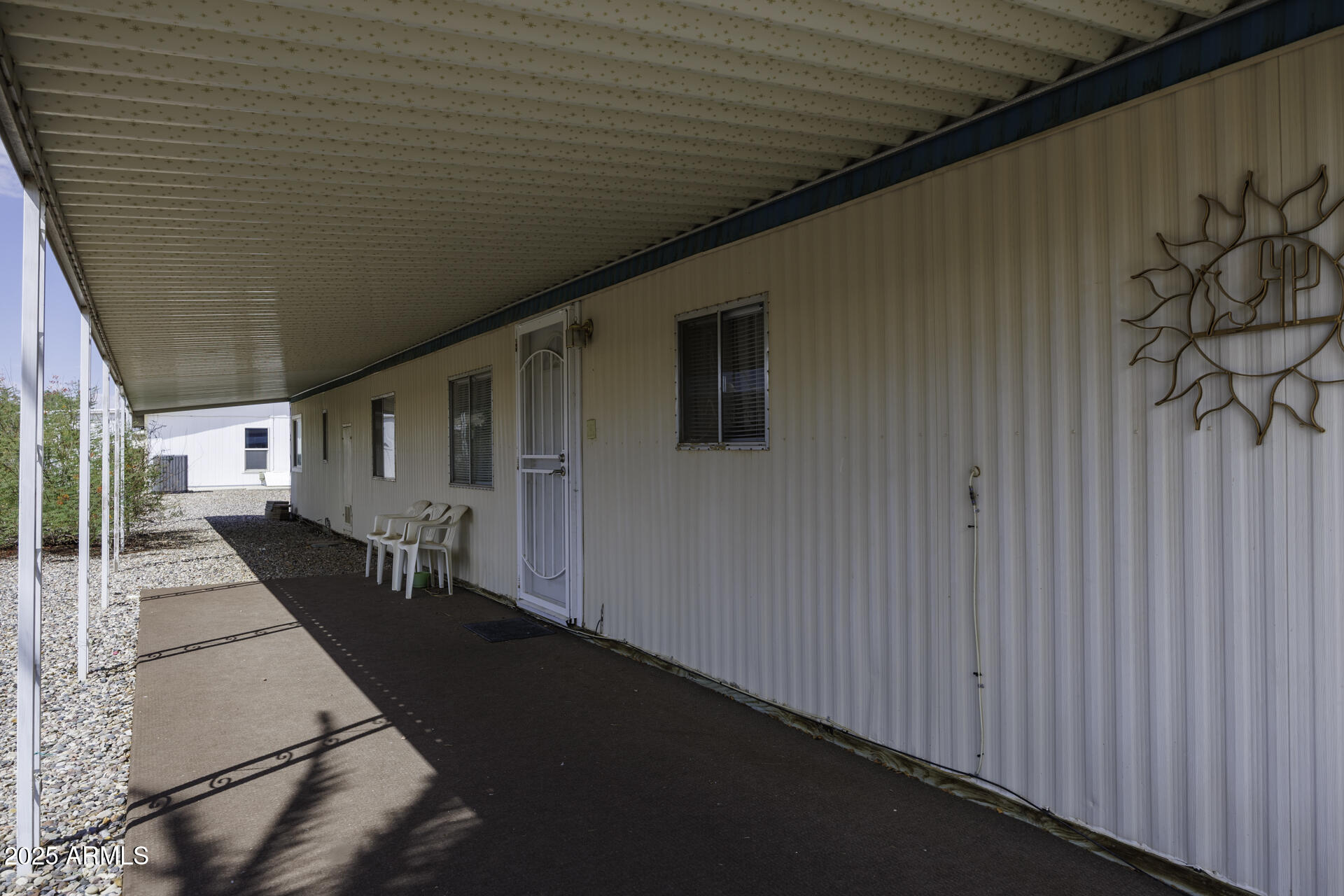 2100 North Trekell Road, Unit 347 Casa Grande, AZ 85122 - Photo 4 of 38 a view of a house with a backyard