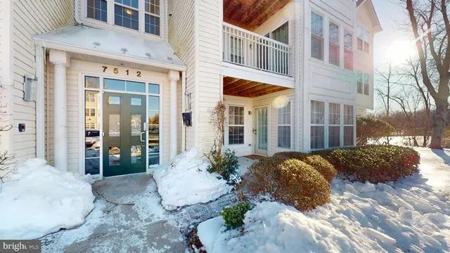 a view of a building with a yard