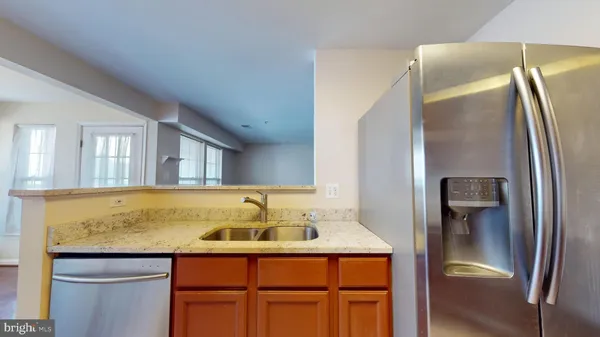 a bathroom with a sink and a large mirror