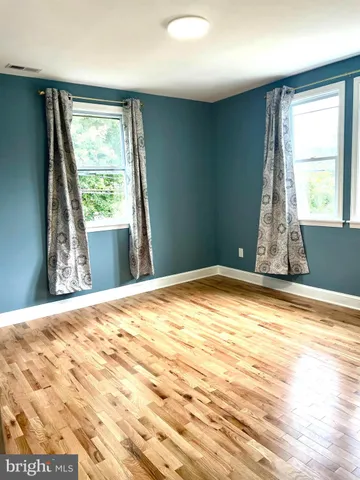 a view of a bedroom and window