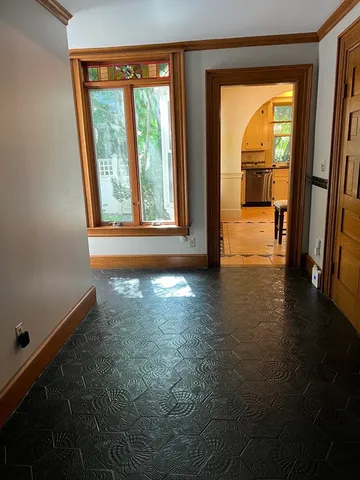 a view of a room with a large window