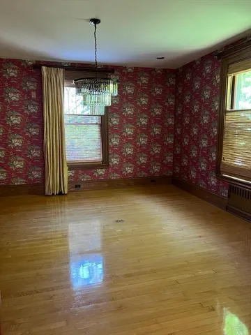 a view of a room with a large window