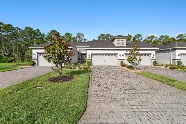 a view of a house with a garage