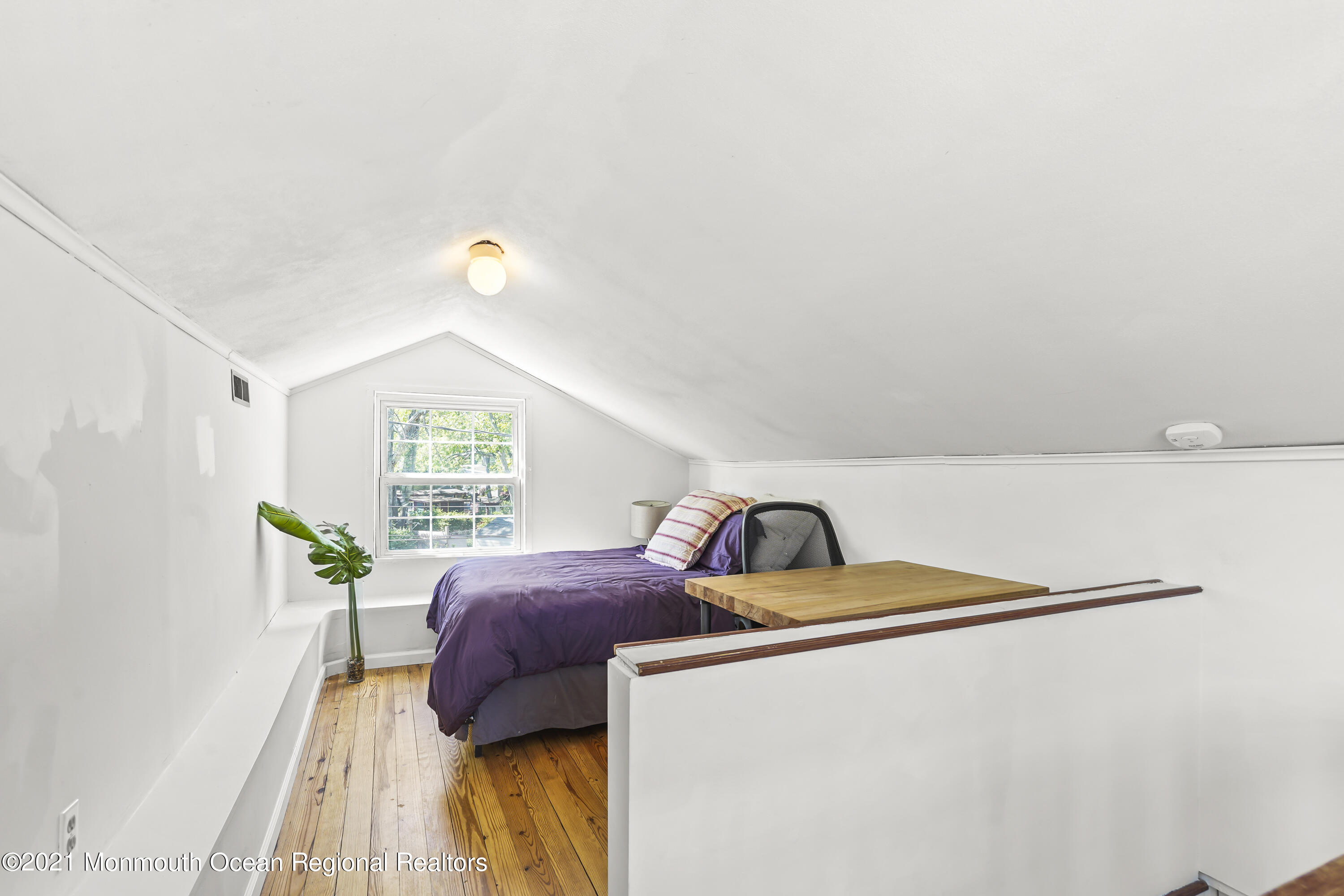 84 Breton Road Brick, NJ 08723 - Photo 15 of 19 a bedroom with a bed and a window