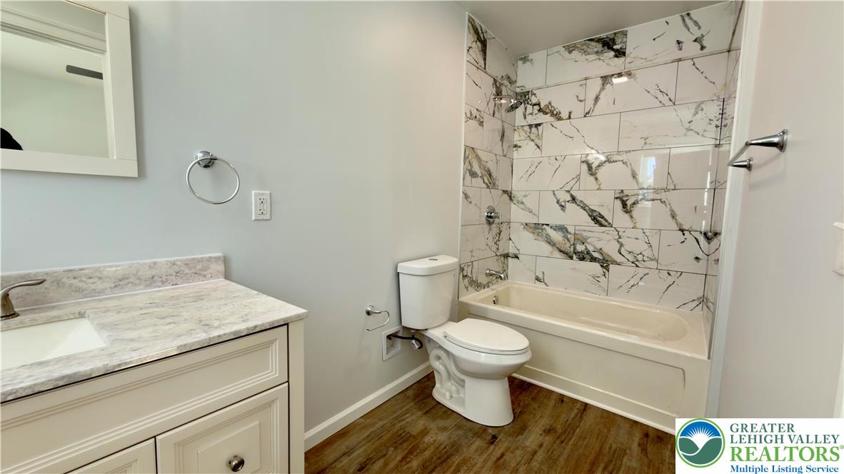 403 North Walnut Street, Unit B Bath, PA 18014 - Photo 15 of 31 a bathroom with a sink toilet and bathtub