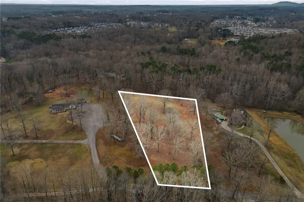 410 North Stringer Road Canton, GA 30115 - Photo 7 of 7 an aerial view of residential houses with outdoor space