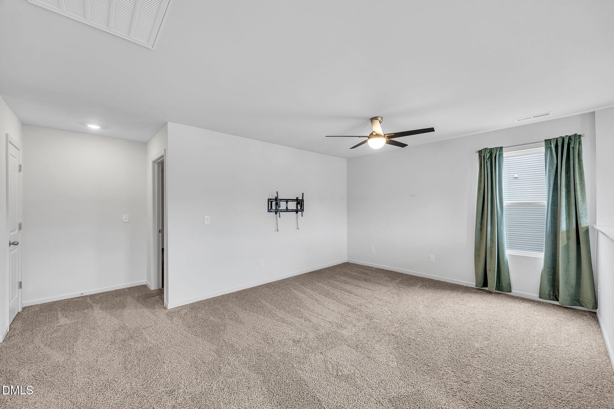 177 Yellowwood Avenue Spring Hope, NC 27882 - Photo 26 of 31 a view of a big room with closet and windows