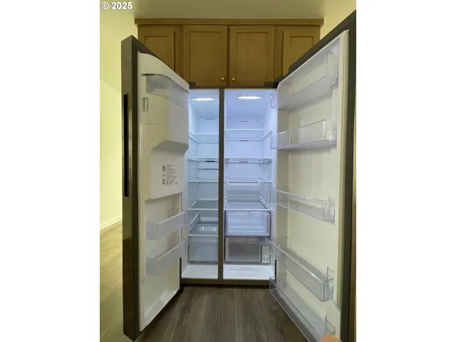 a bathroom with a shower and a sink