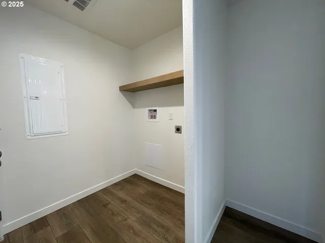 a view of small space with wooden floor