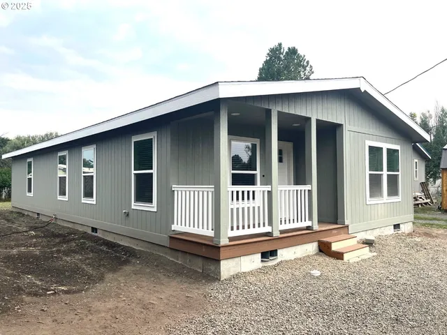a view of a house with a porch
