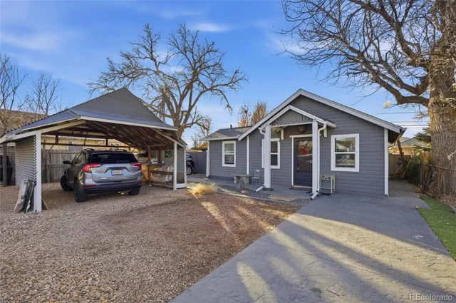 a view of a car in front of house