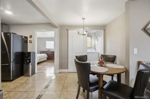 a view of a dining room with furniture