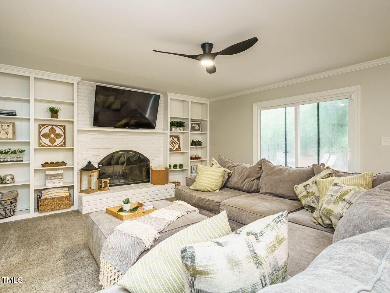 Family room with builtins & fireplace