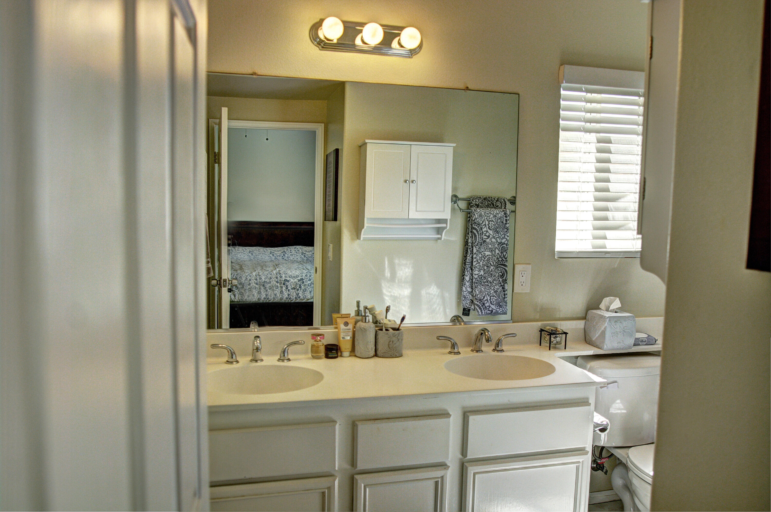 79379 Paseo Del Rey La Quinta, CA 92253 - Photo 13 of 24 a bathroom with a sink and a mirror