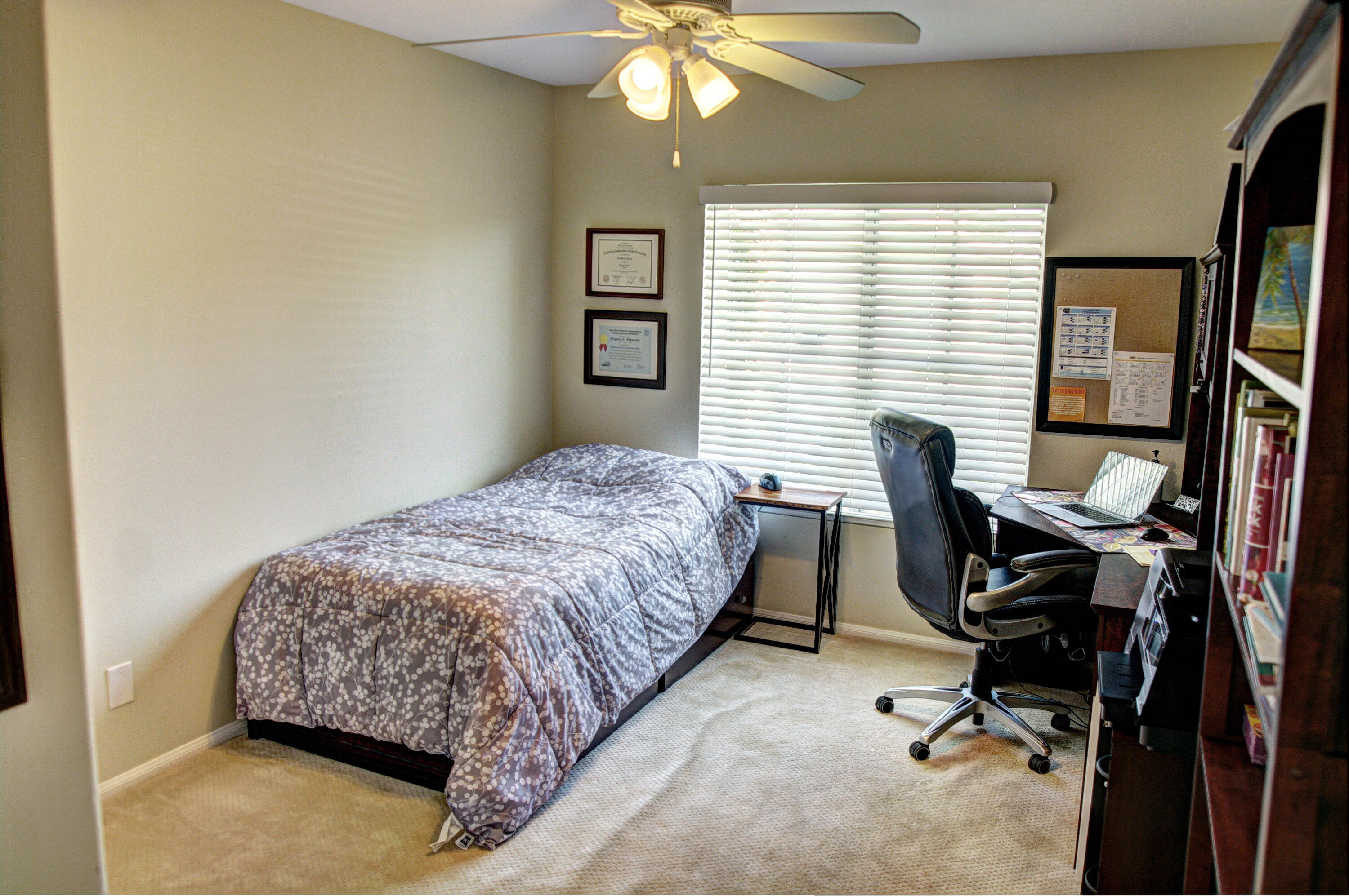 79379 Paseo Del Rey La Quinta, CA 92253 - Photo 16 of 24 a bedroom with a bed and a window