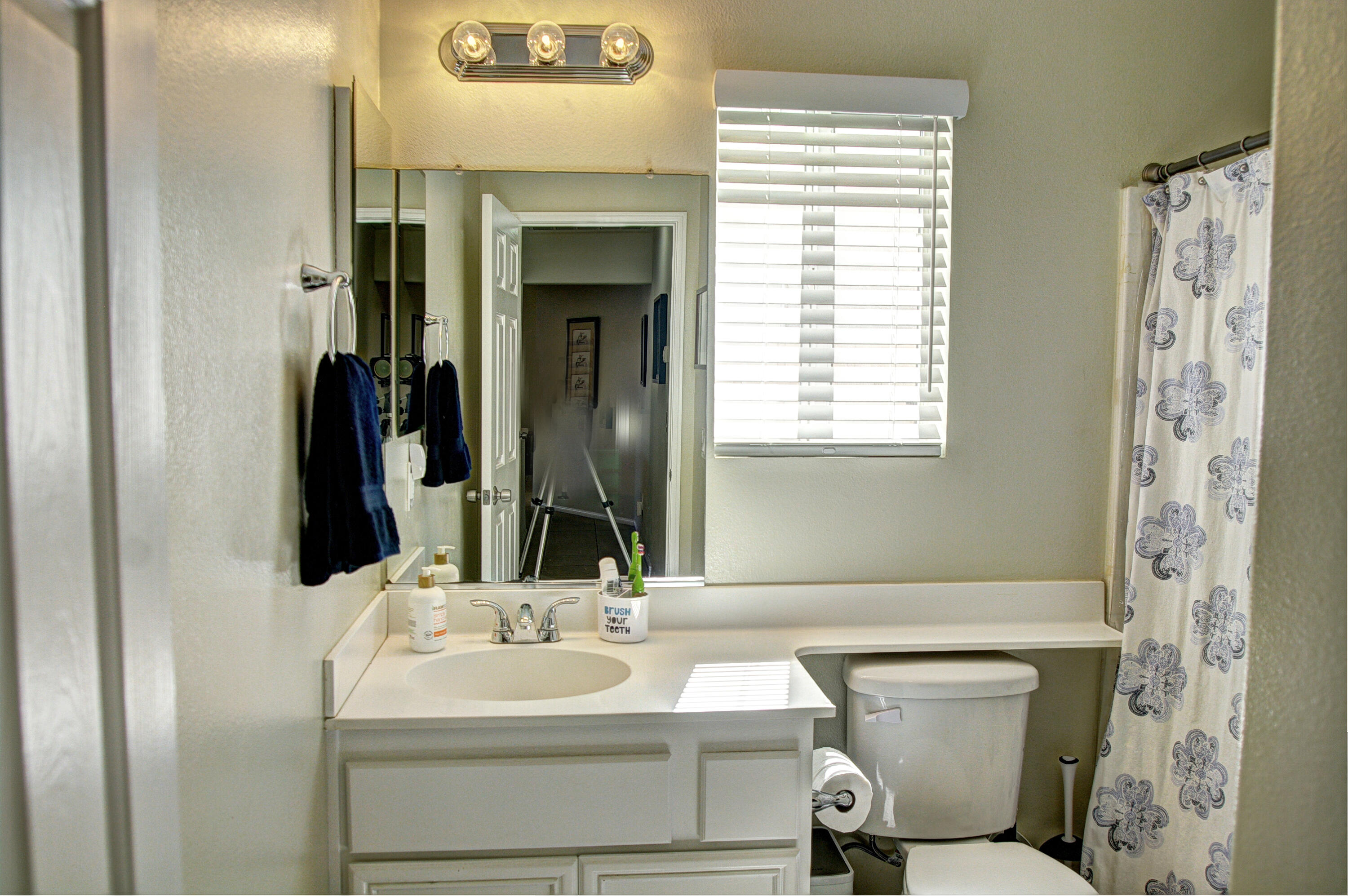 79379 Paseo Del Rey La Quinta, CA 92253 - Photo 17 of 24 a bathroom with a toilet sink and mirror
