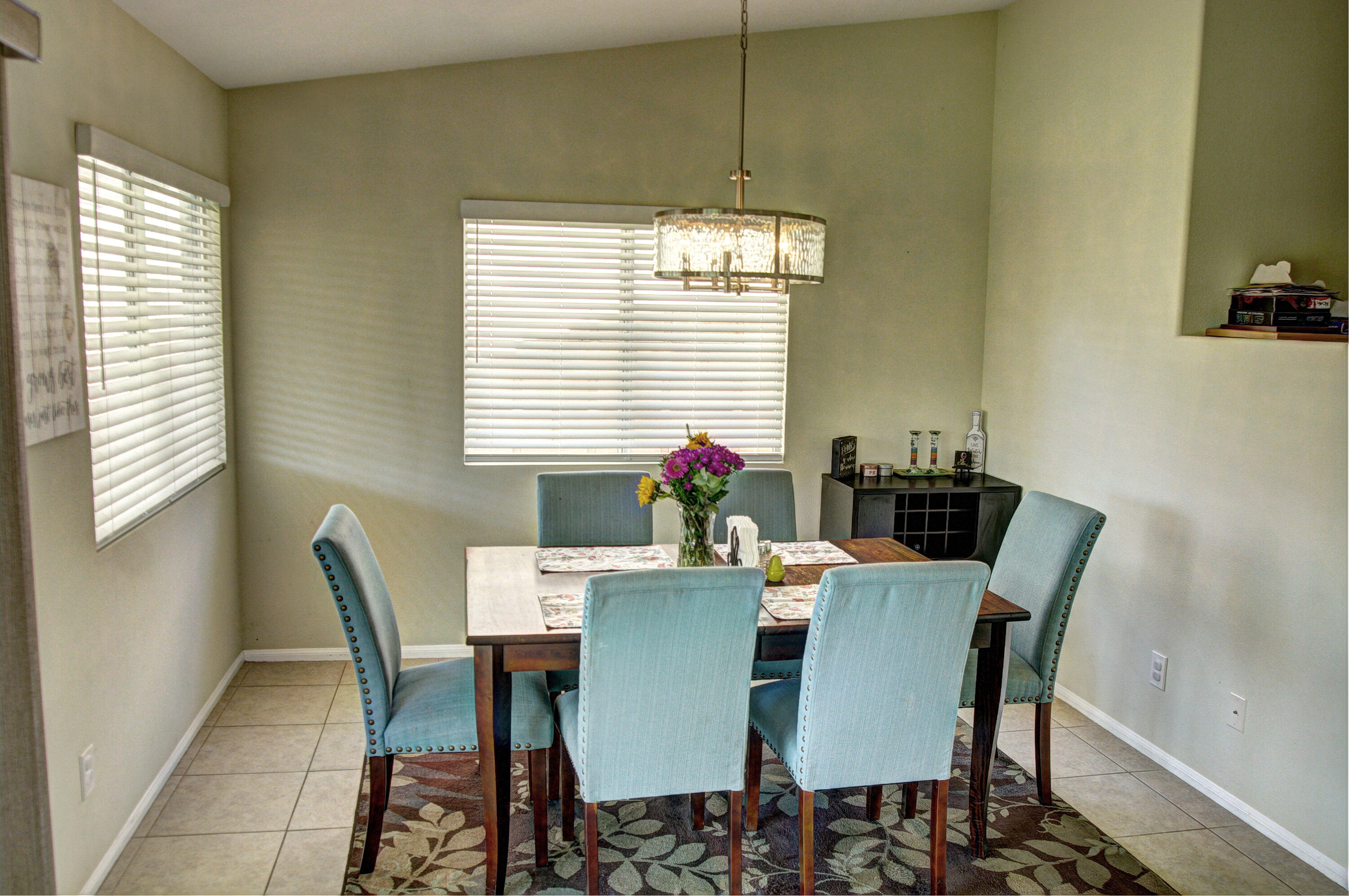 79379 Paseo Del Rey La Quinta, CA 92253 - Photo 10 of 24 a dining room with furniture and window