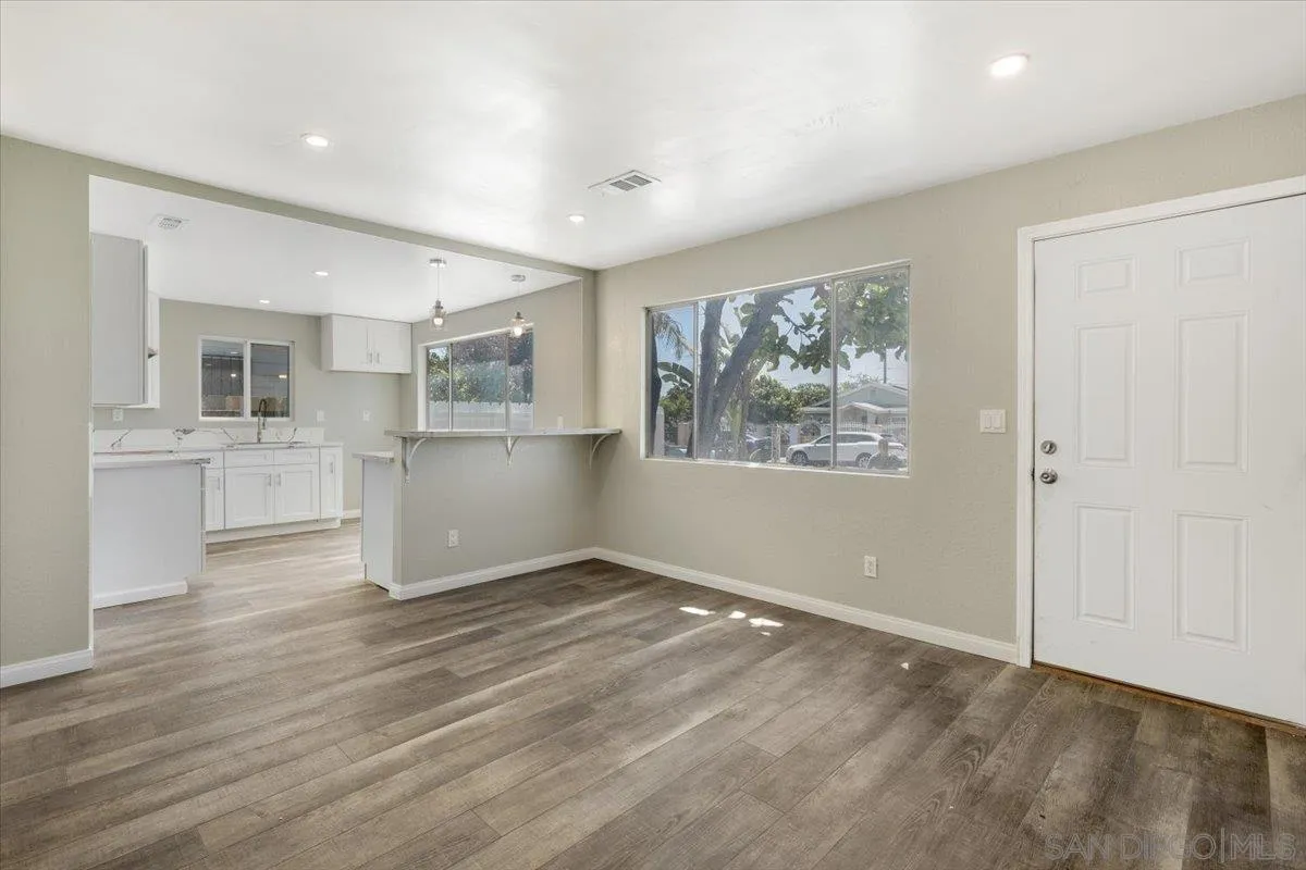 230 Zenith Street Chula Vista, CA 91911 - Photo 11 of 21 a view of kitchen with wooden floor and window
