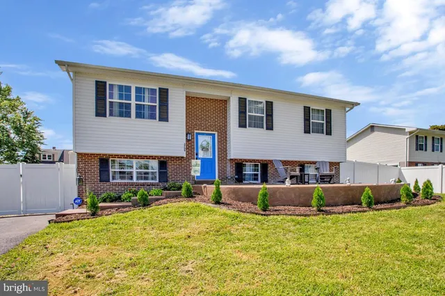 a house view with a garden space