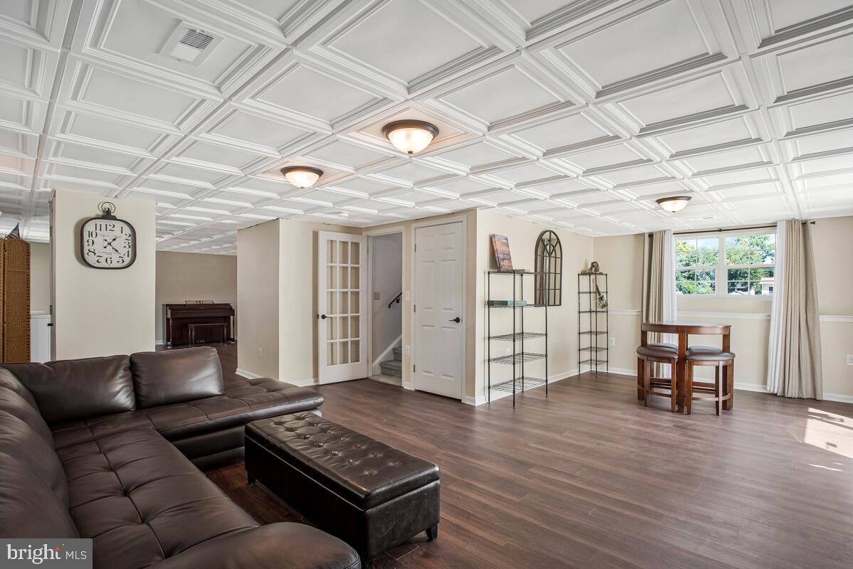3709 29th Street Chesapeake Beach, MD 20732 - Photo 21 of 71 a living room with furniture and wooden floor
