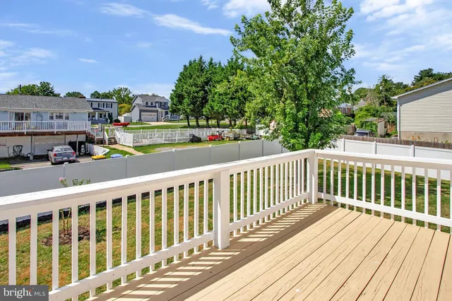 a view of a backyard with pathway