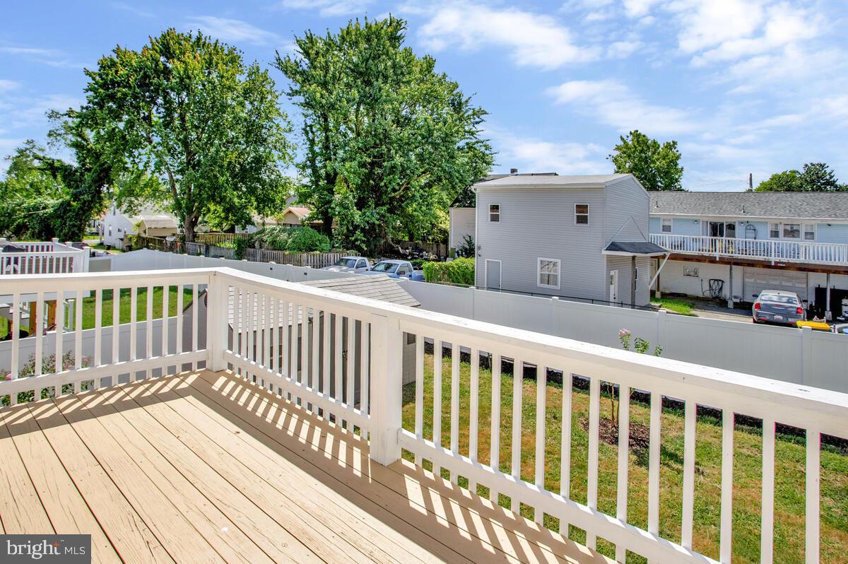 3709 29th Street Chesapeake Beach, MD 20732 - Photo 27 of 71 a view of a house with a deck