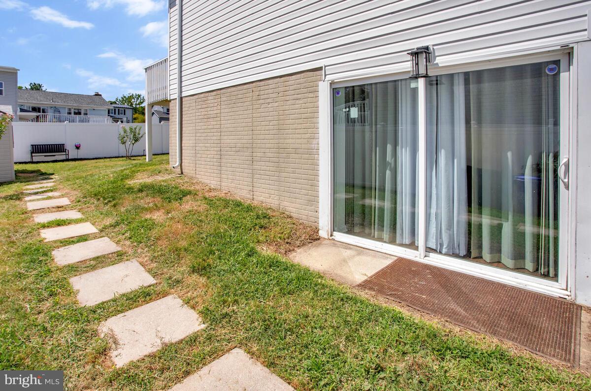 3709 29th Street Chesapeake Beach, MD 20732 - Photo 32 of 71 a view of a backyard with pathway