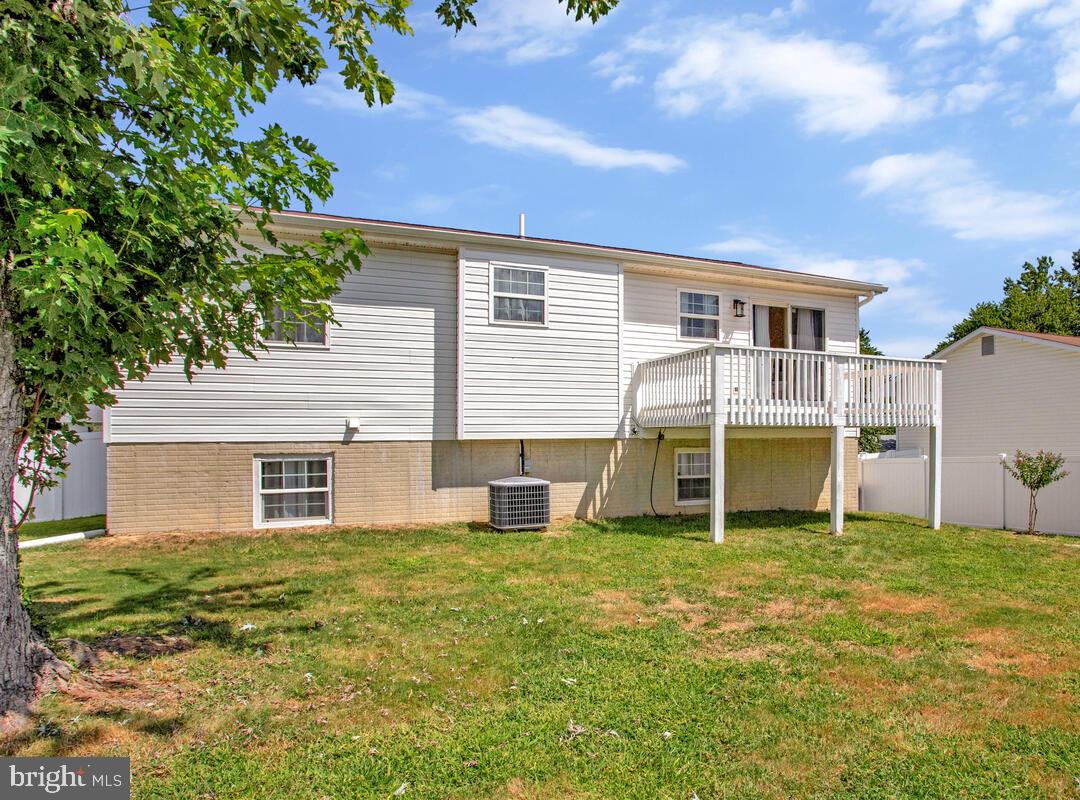 3709 29th Street Chesapeake Beach, MD 20732 - Photo 34 of 71 a house view with a sitting space and garden