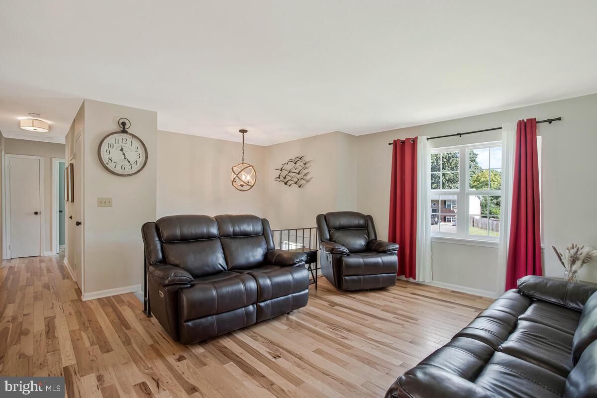 3709 29th Street Chesapeake Beach, MD 20732 - Photo 6 of 71 a living room with furniture and a window