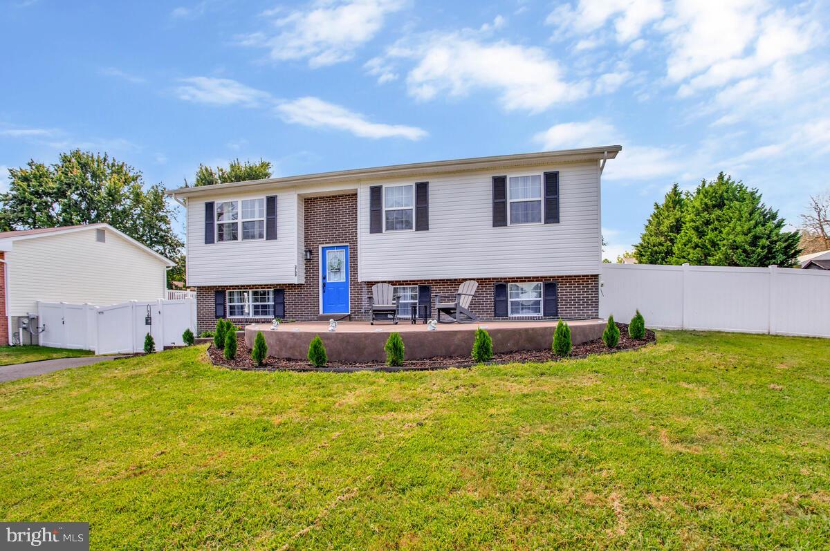 3709 29th Street Chesapeake Beach, MD 20732 - Photo 69 of 71 a view of a house with a big yard and a large tree