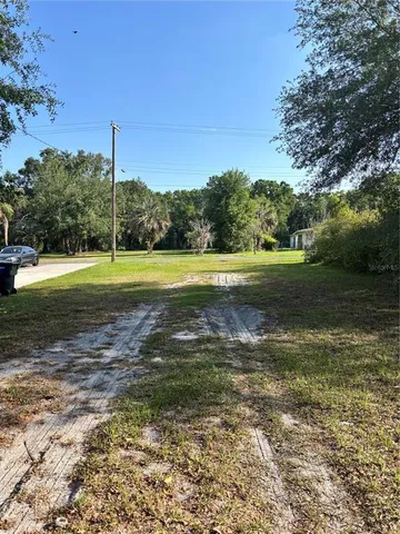 a view of a golf course with a lake