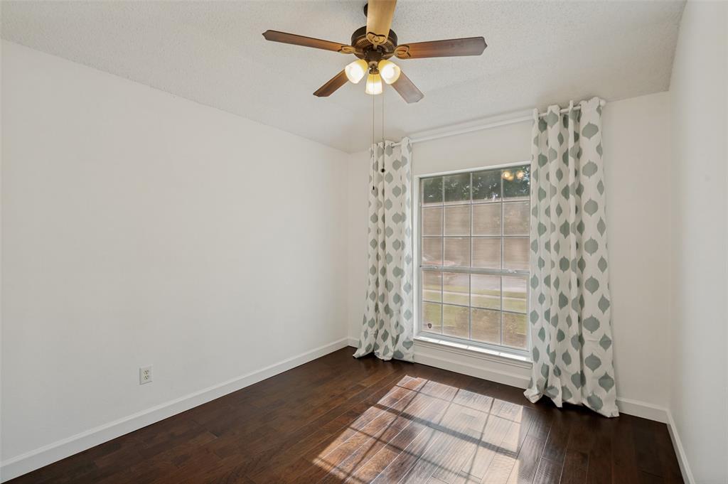 8160 Tower Road Frisco, TX 75035 - Photo 20 of 25 wooden floor in an empty room with a window