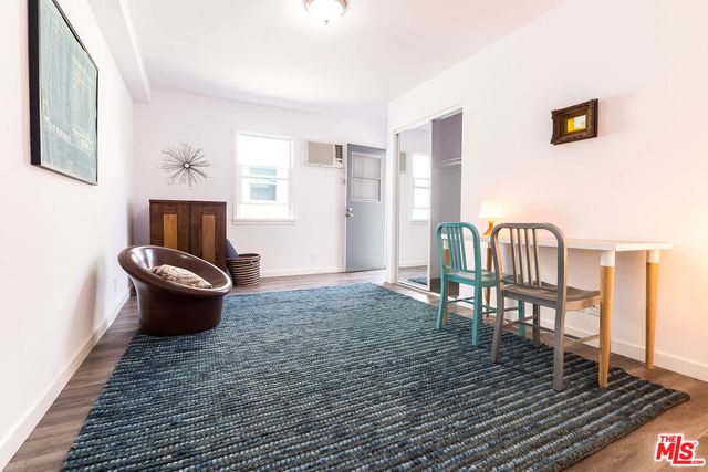 an aerial view of a house with yard