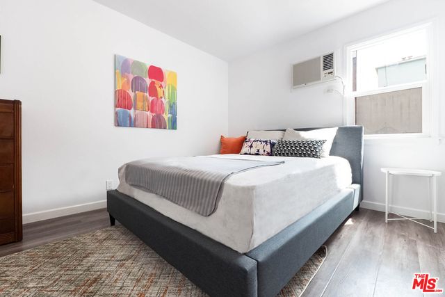 a bathroom with a sink and a window