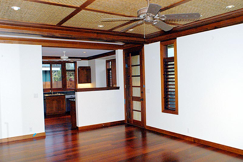 5345 Weke Road Hanalei, HI 96714 - Photo 3 of 20 a view of an empty room with wooden floor and a window