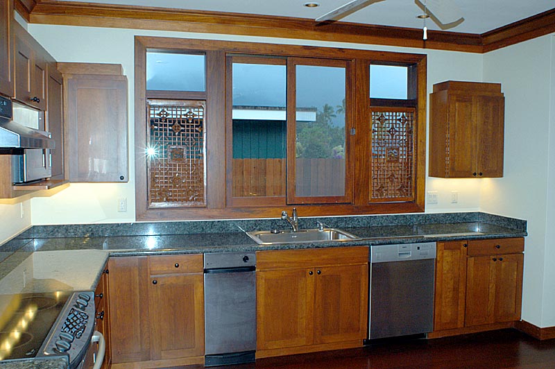 5345 Weke Road Hanalei, HI 96714 - Photo 4 of 20 a kitchen with granite countertop a sink and a stove
