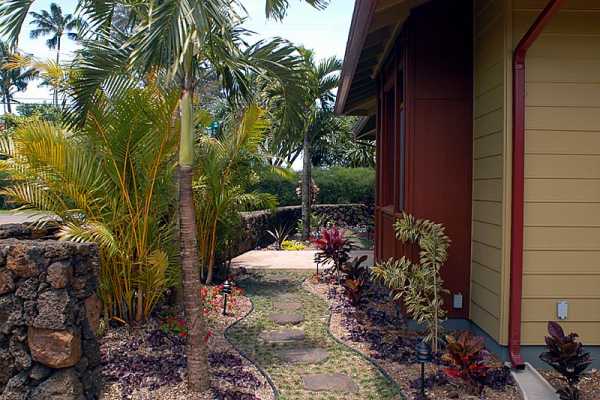 5345 Weke Road Hanalei, HI 96714 - Photo 7 of 20 a view of a chair and table in a backyard