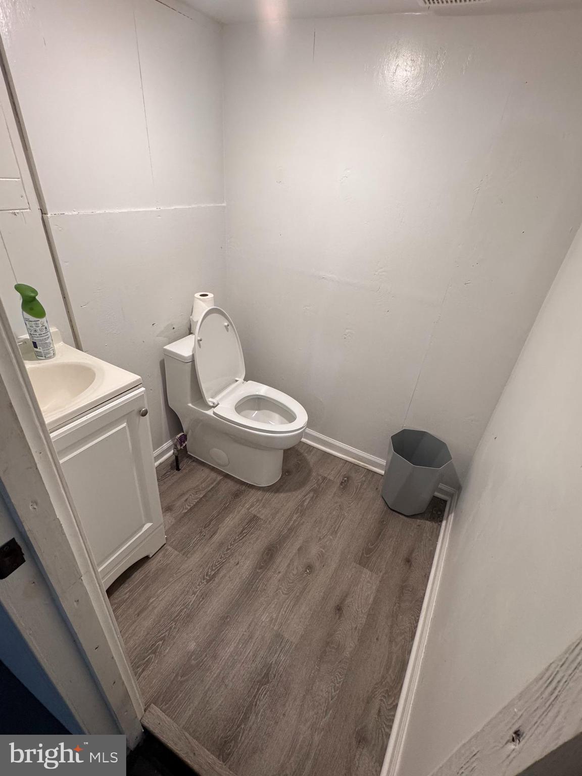 222 Townsend Avenue Baltimore, MD 21225 - Photo 18 of 24 a bathroom with a toilet and a sink