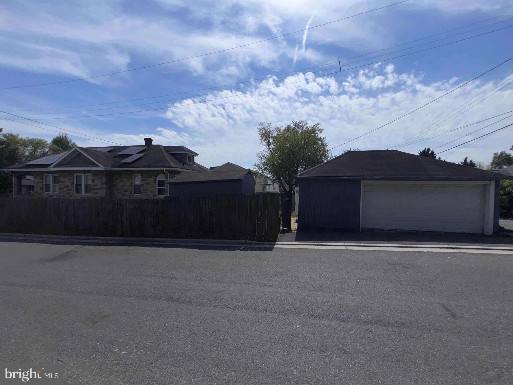 222 Townsend Avenue Baltimore, MD 21225 - Photo 23 of 24 a view of a house with a yard