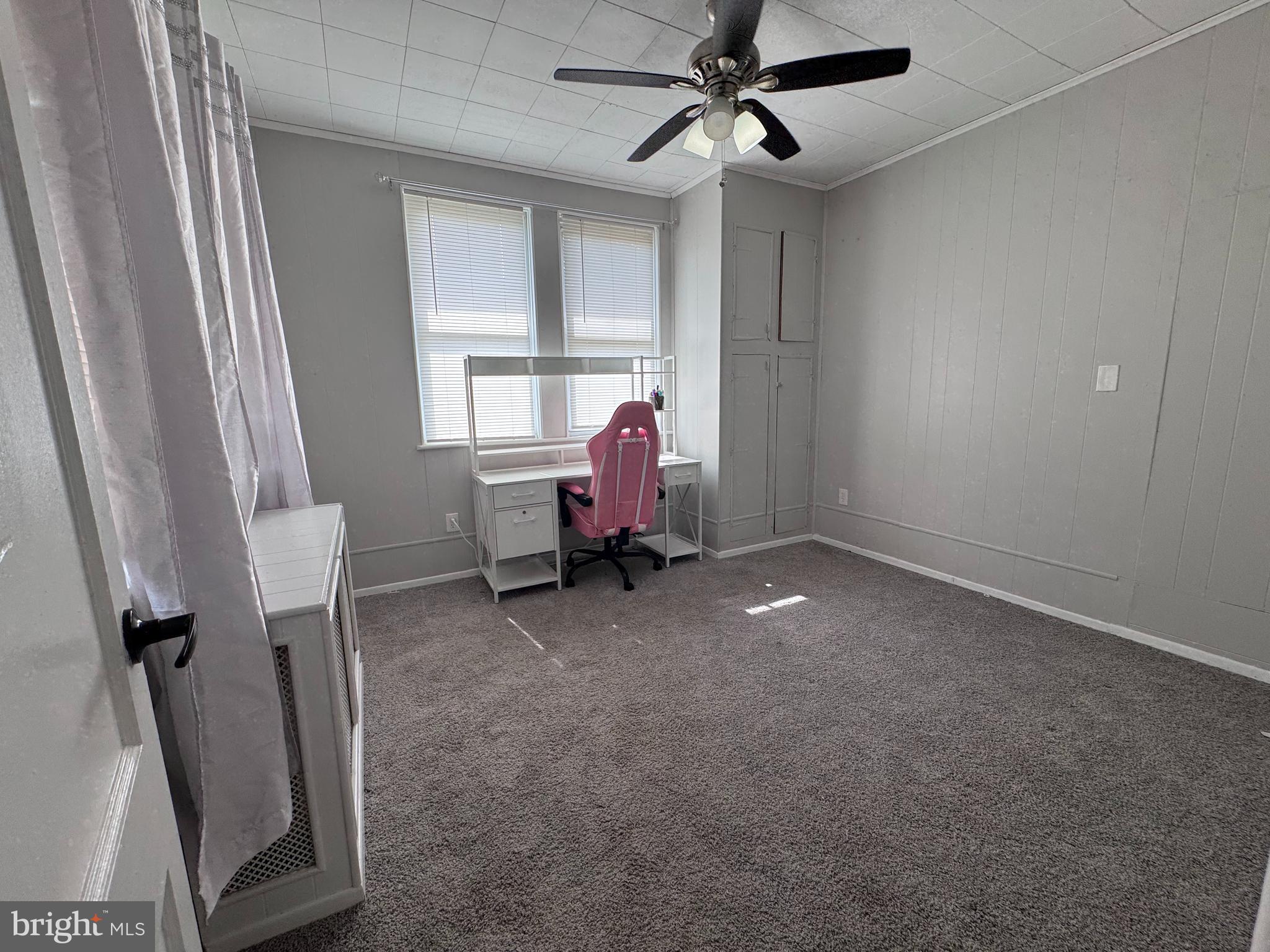 222 Townsend Avenue Baltimore, MD 21225 - Photo 10 of 24 a living room with furniture and a window