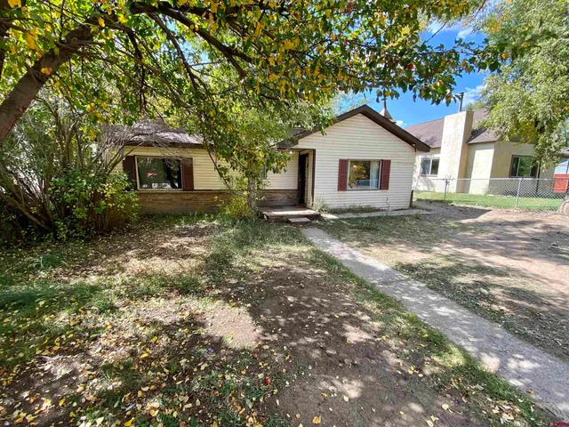 a house view with a garden space