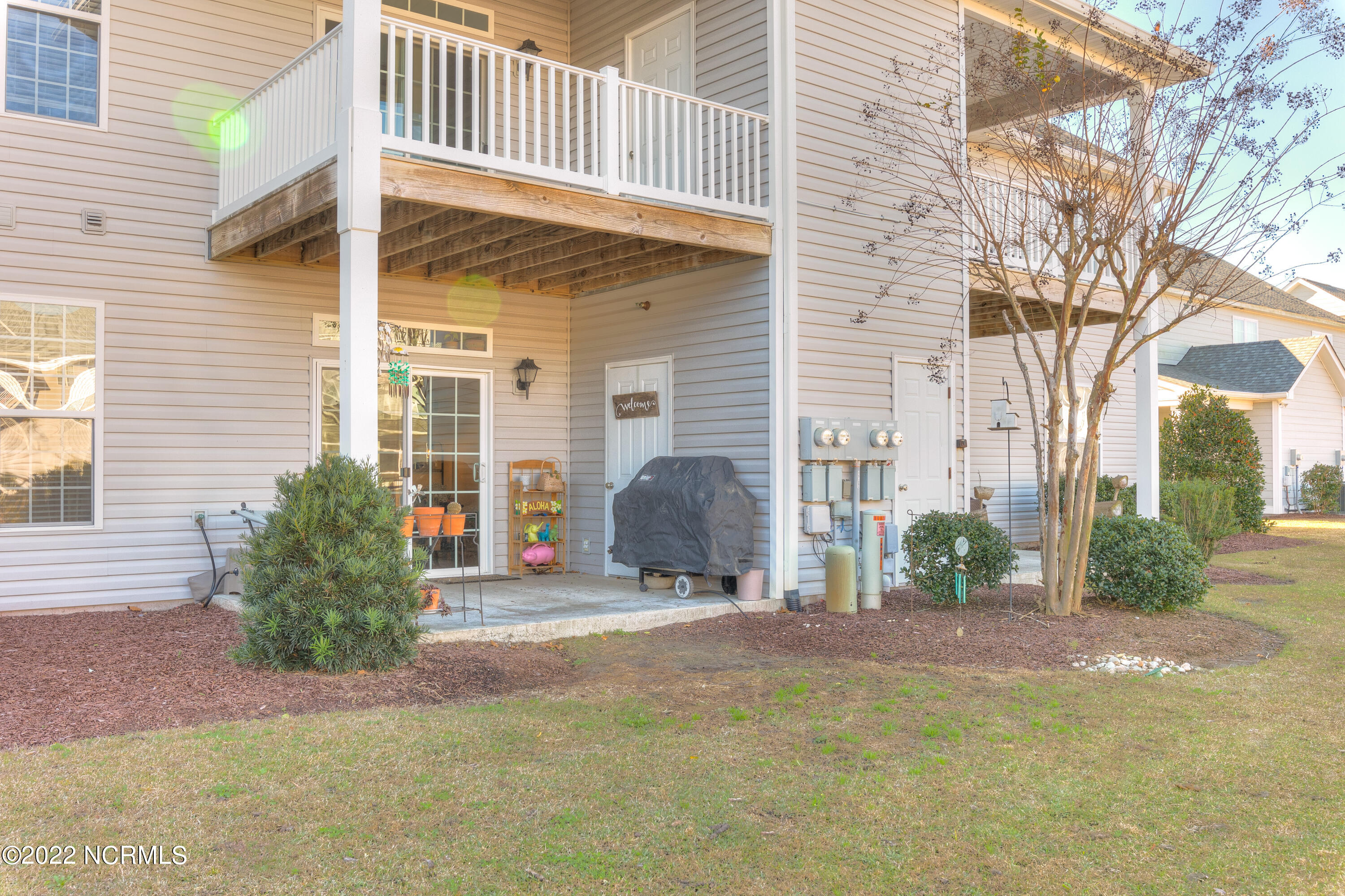 175 Old Murdoch Road, Unit 103 Morehead City, NC 28570 - Photo 18 of 22 Patio with storage
