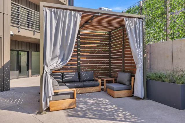 a view of a building with potted plants