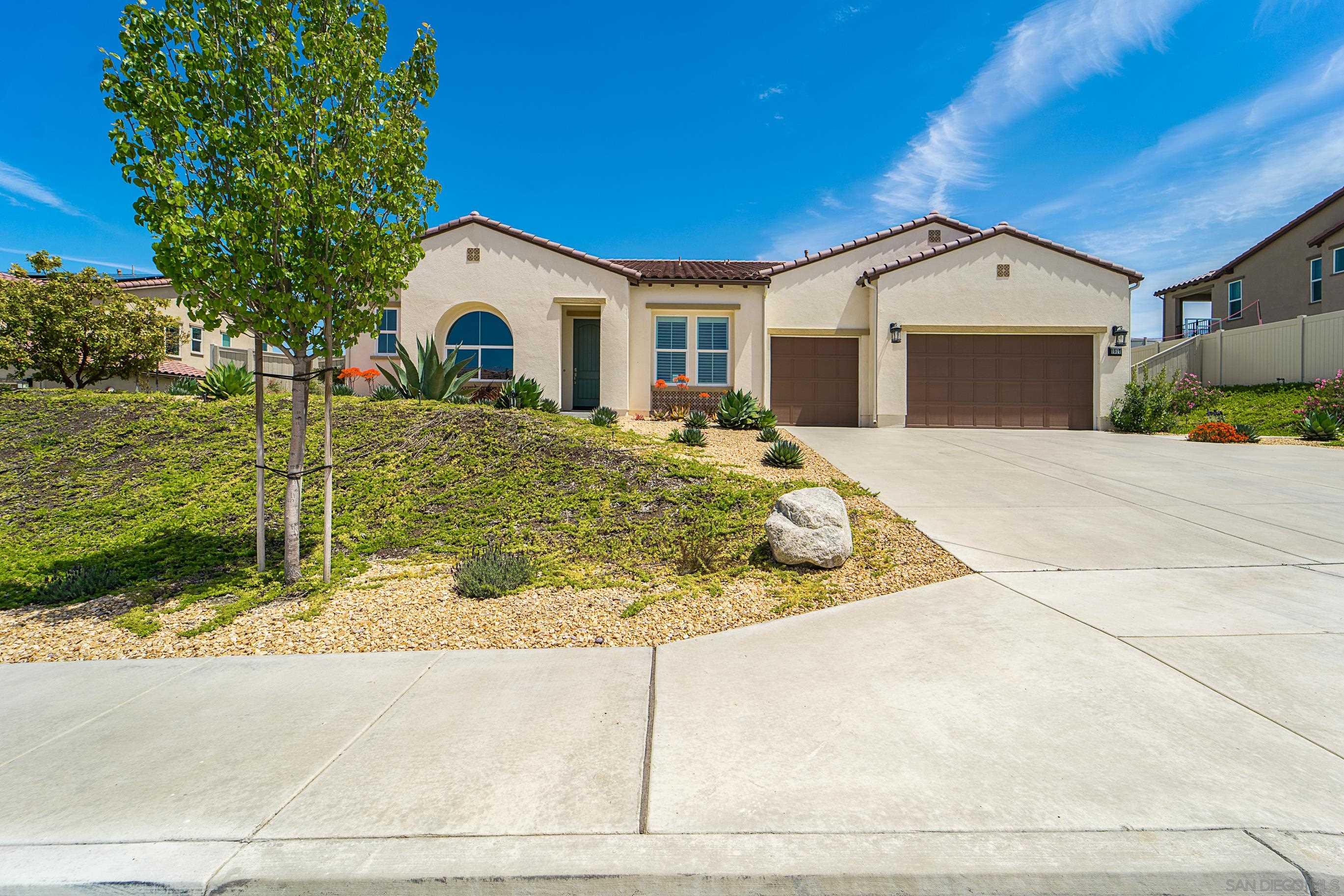 1517 Vista Verde Drive Escondido, CA 92026 - Photo 1 of 37 a front view of a house with garden
