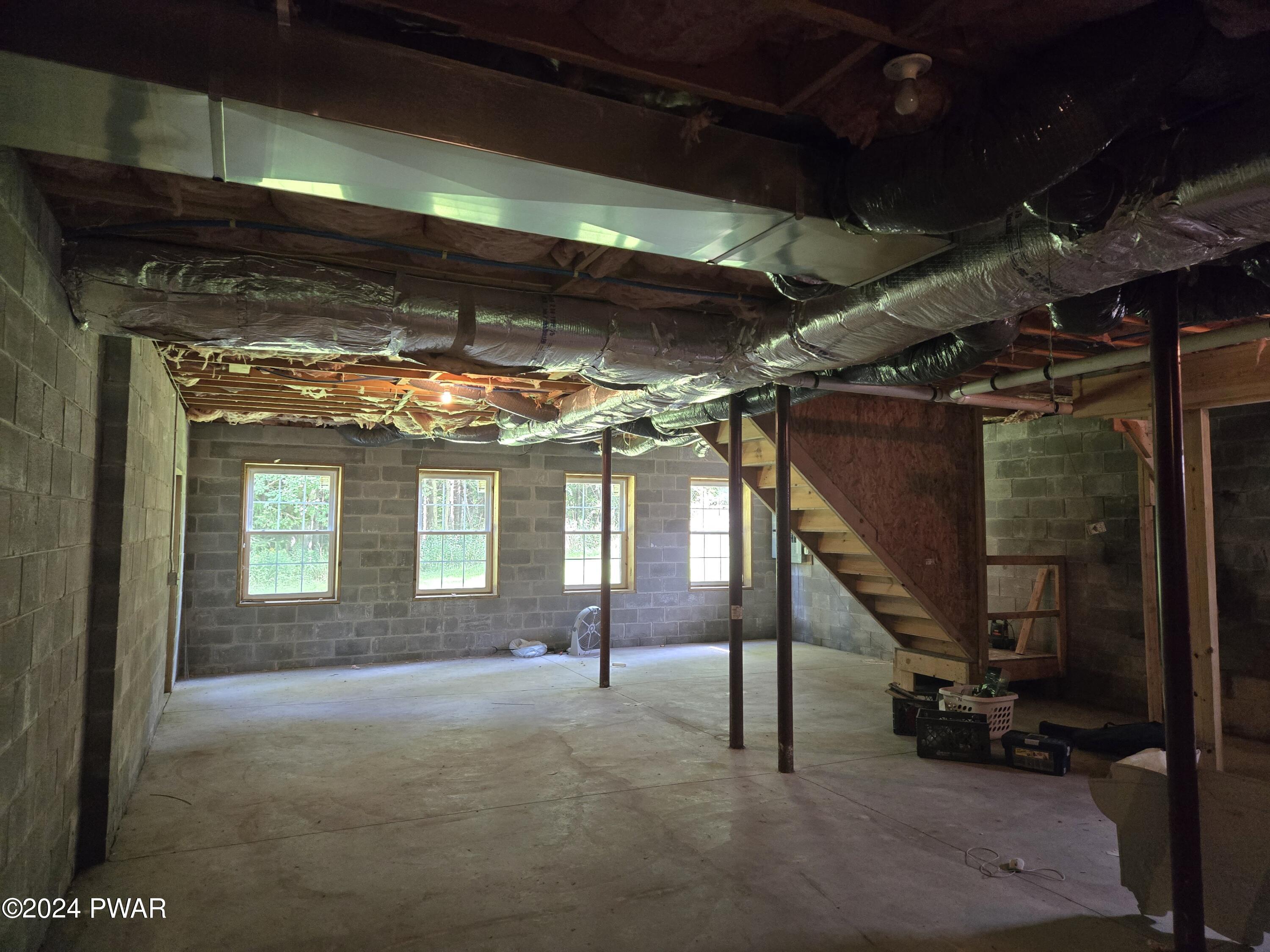 224 Old Racht Road Waymart, PA 18472 - Photo 30 of 39 a view of an empty room with a fireplace