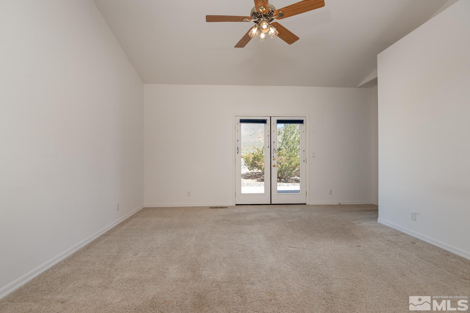 2876 Jackie Circle Minden, NV 89423 - Photo 15 of 40 an empty room with windows