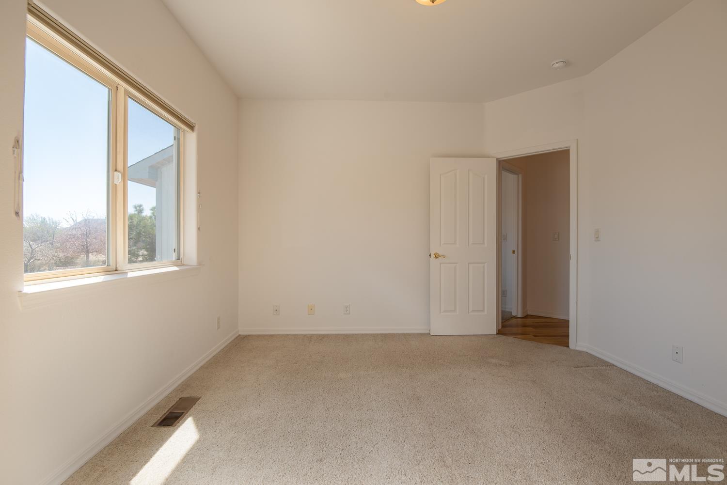 2876 Jackie Circle Minden, NV 89423 - Photo 21 of 40 an empty room with a window